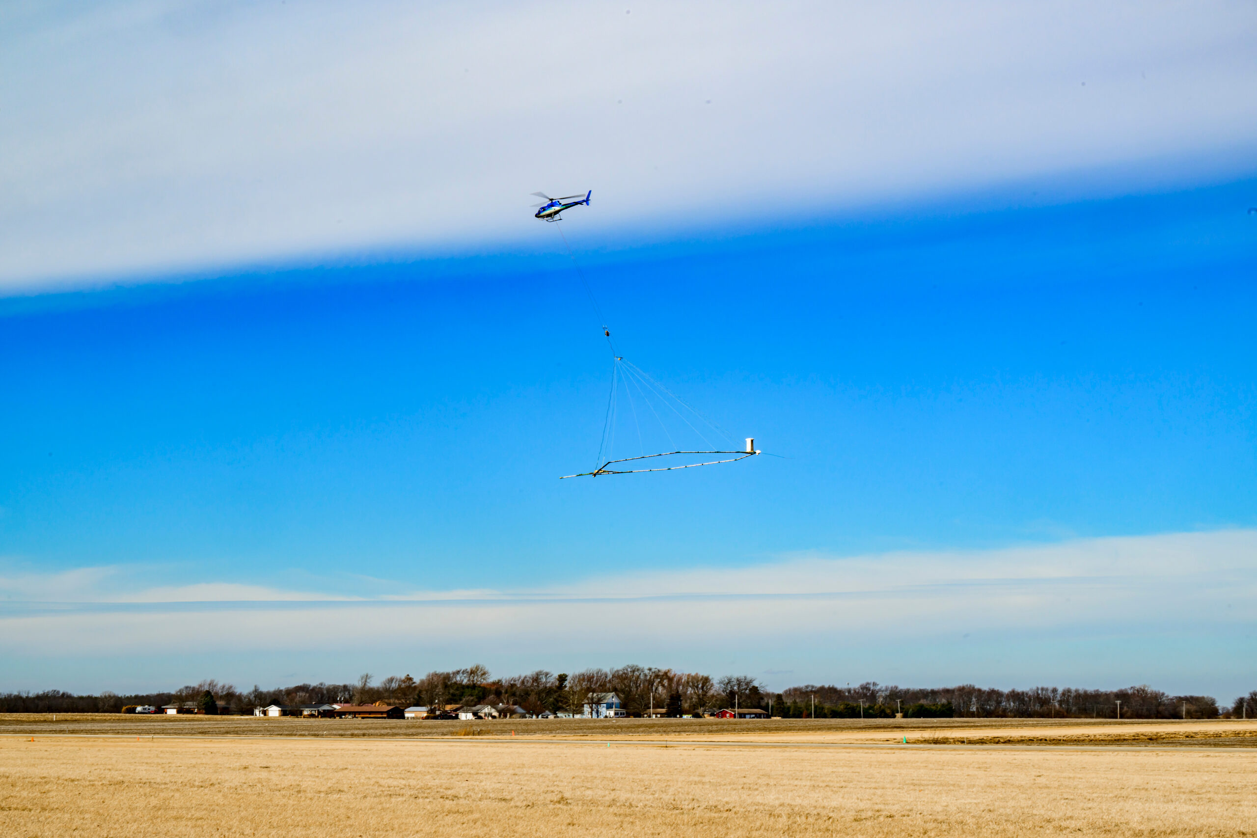 Helicopter pulling HTEM equipment.
